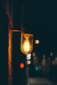 Close-up of illuminated light bulb