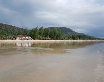 Scenic view of beach against sky