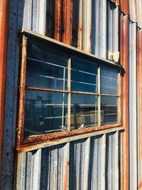 Abandoned building seen through window