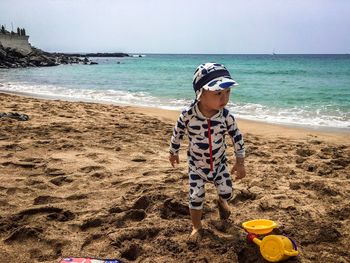 Full length of boy on beach