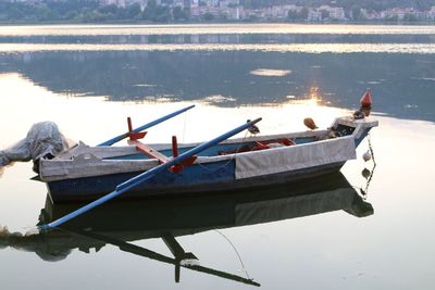 High angle view of fishing boats moored in lake