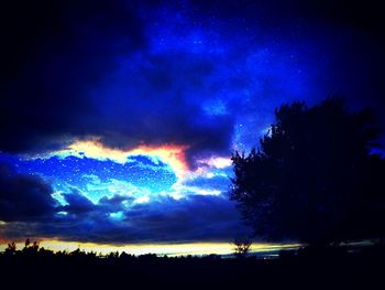 Scenic view of landscape against cloudy sky