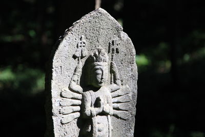 Close-up of old statue