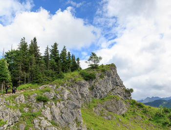 Low angle view of rocks against sky