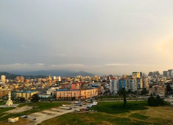 High angle view of buildings in city against sky