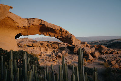 Scenic view of rock formations against sky