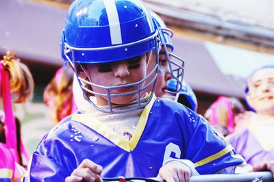 Close-up of girl wearing helmet