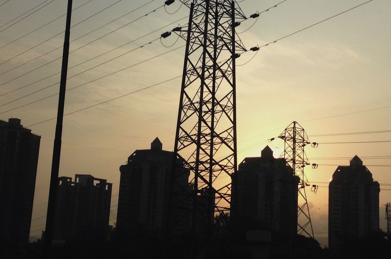 built structure, architecture, silhouette, sunset, cable, tower, building exterior, low angle view, connection, electricity pylon, sky, outdoors, skyscraper, city, electricity, real people, day