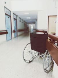 Bicycle parked in corridor of building