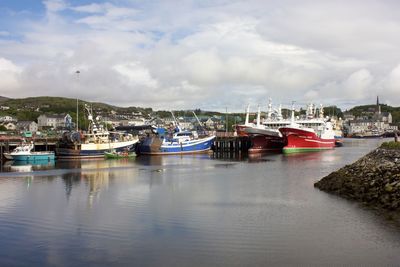 Boats moored in harbor