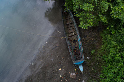 High angle view of boat moored on riverbank