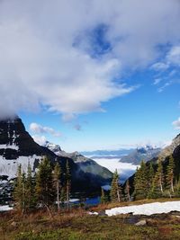 Scenic view of snowcapped mountains against sky