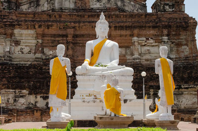 Buddha statues outside old ruin temple at ayuthaya province