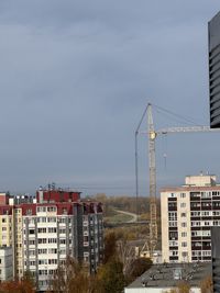 Buildings in city against sky
