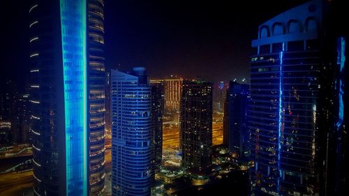 Illuminated cityscape at night