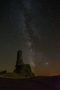 Low angle view of star field against sky at night