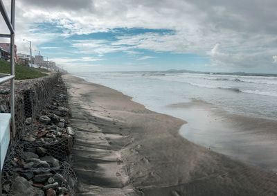 Scenic view of beach against sky