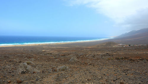 Scenic view of beach against sky
