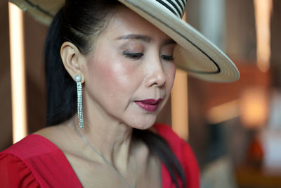 Close-up portrait of woman looking away