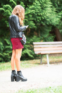 Full length of woman standing outdoors