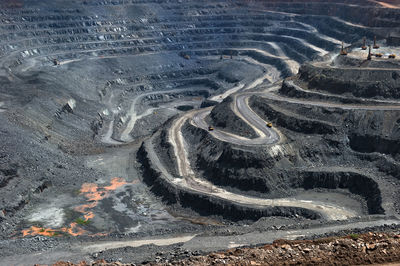 High angle view of winding roads at open-pit mine