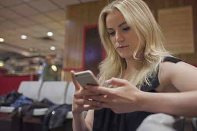 A young woman on her cell phone.