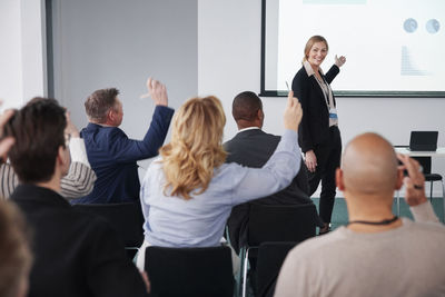 Woman having presentation during business meeting