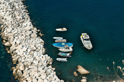 High angle view of boats moored on sea