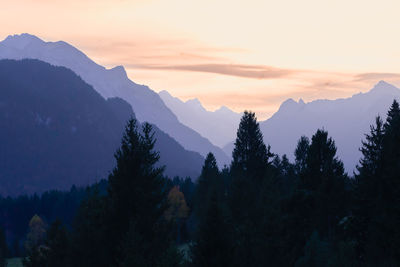 Scenic view of mountains against sky during sunset