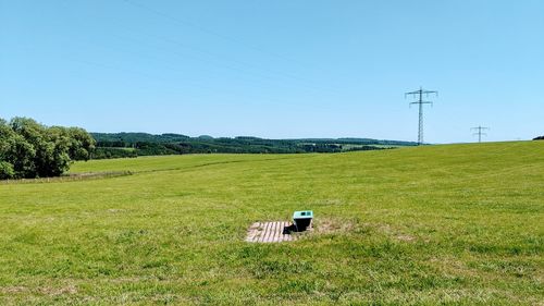 Tractor on field against sky