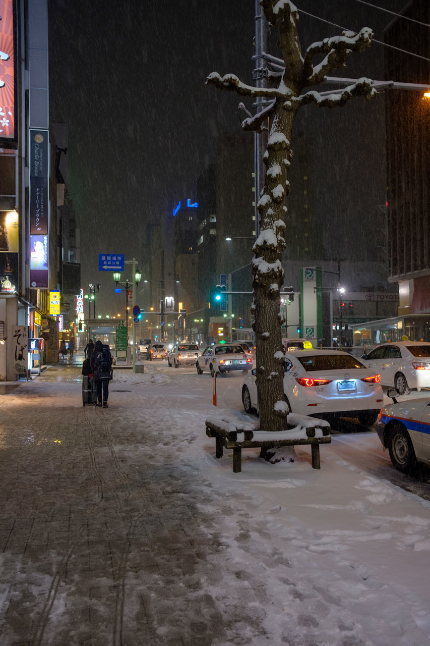 ILLUMINATED CITY DURING WINTER