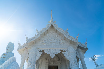 Low angle view of church against clear blue sky