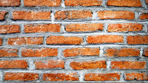 Full frame shot of red brick wall