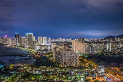 High angle view of illuminated buildings in city against sky
