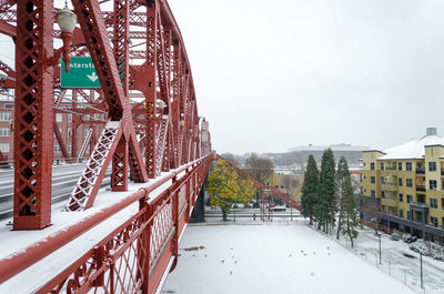 Broadway bridge against clear sky during winter