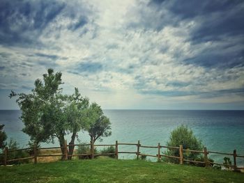 Scenic view of sea against cloudy sky