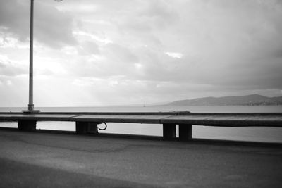 Bridge over sea against sky