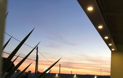 Low angle view of street light against sky