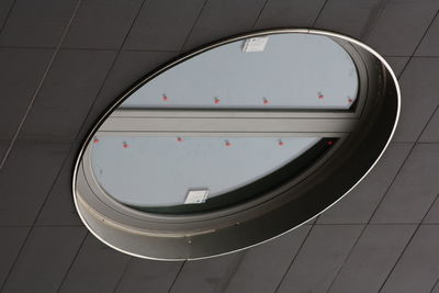 Reflection of sky on side-view mirror