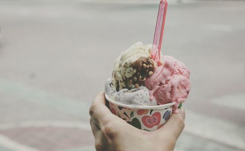 Hand holding ice cream