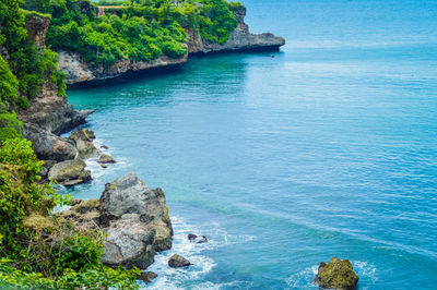 High angle view of rock formation in sea