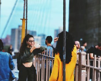 Woman standing on the road