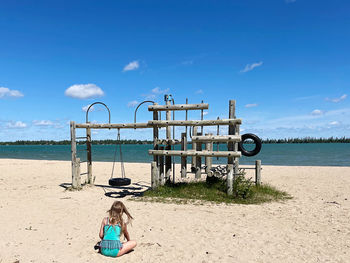 Playing in the sand lakeside beach