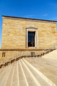 Building facade against blue sky