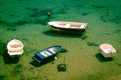 High angle view of boats moored at beach