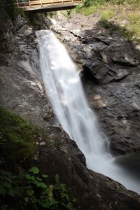 View of waterfall in forest