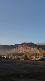 Scenic view of desert against clear sky