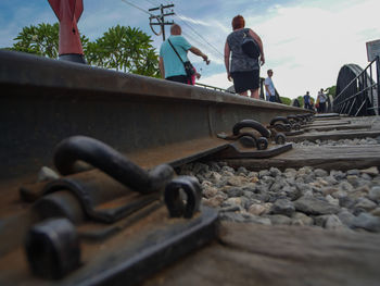 Man standing on railroad track