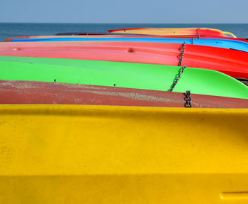 Close-up of sailboat in sea against sky