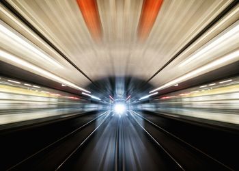 Blurred motion of illuminated tunnel